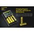 Scopri Nitecore UMS4 caricabatterie intelligente quattro slot USB-C ricarica rapida per batterie 18650 21700 26650 design compatto per appassionati e avventure all'aperto